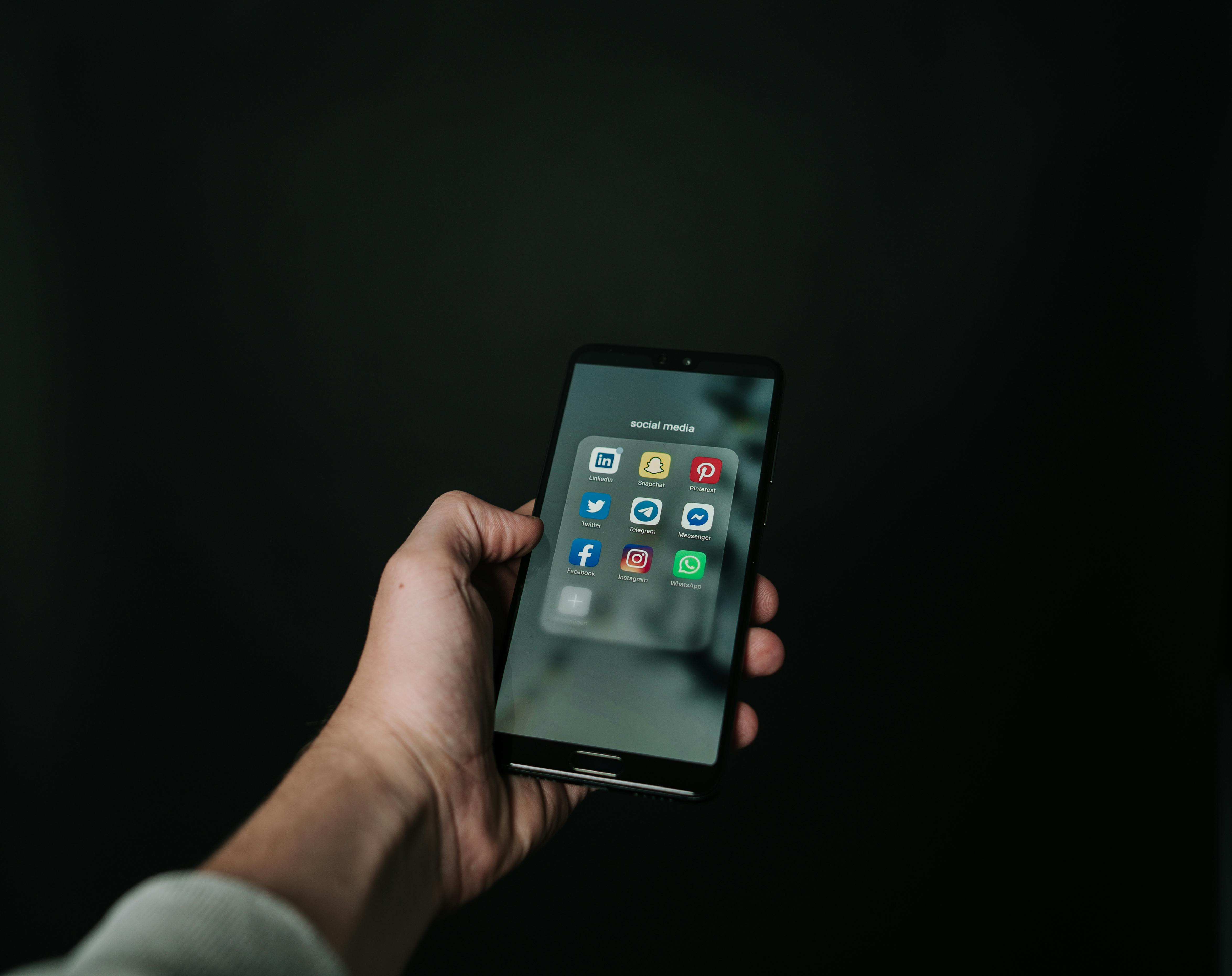 Young person scrolling on a phone