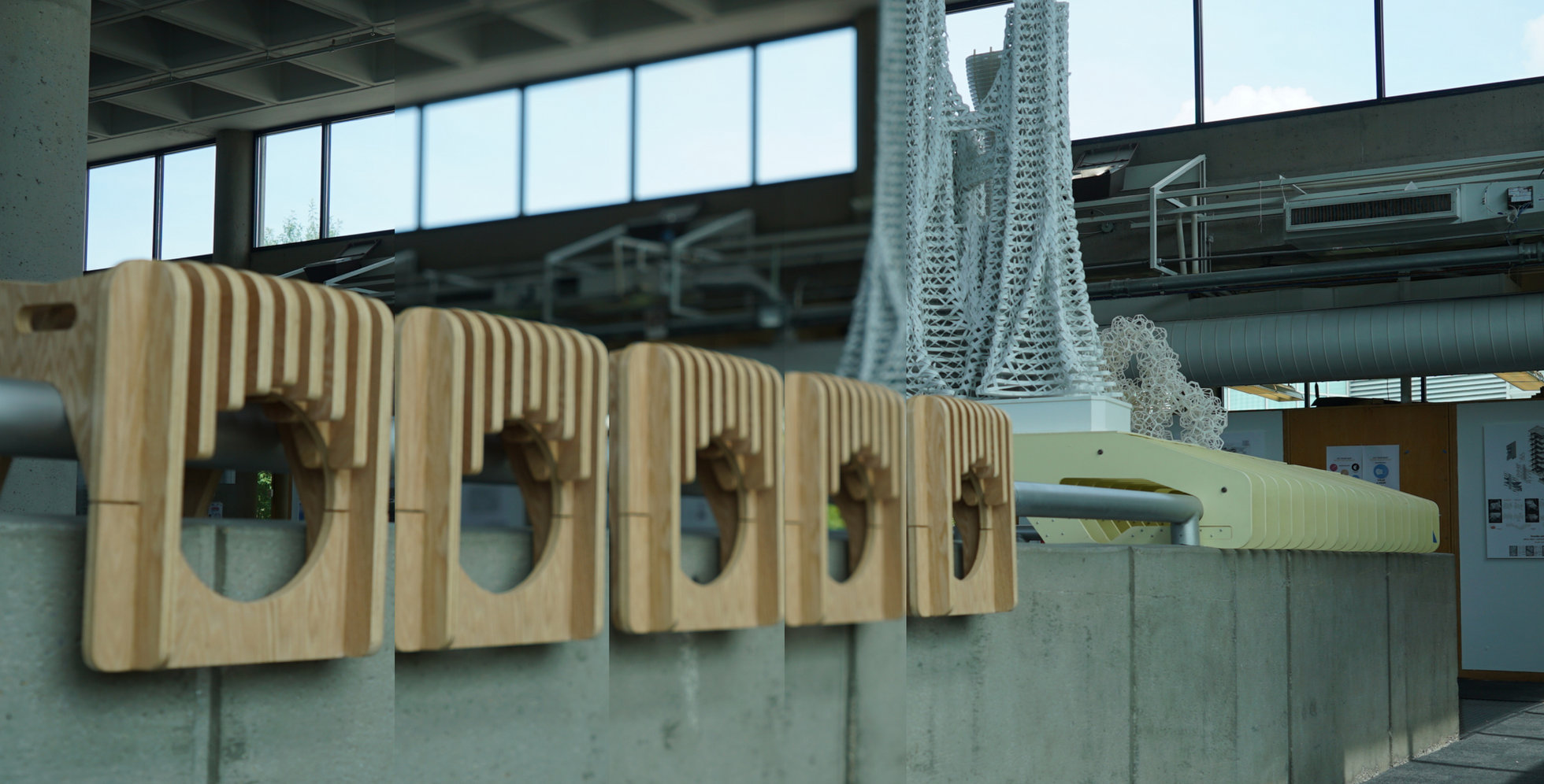 A row of stools stored along the railing