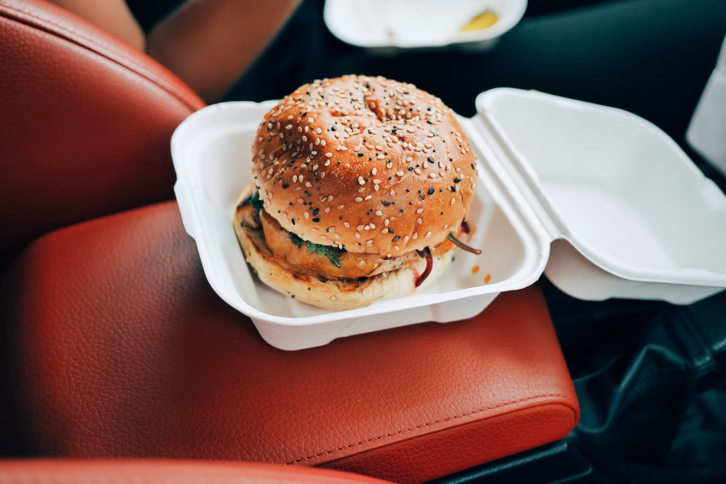 Burger in a foam clamshell container